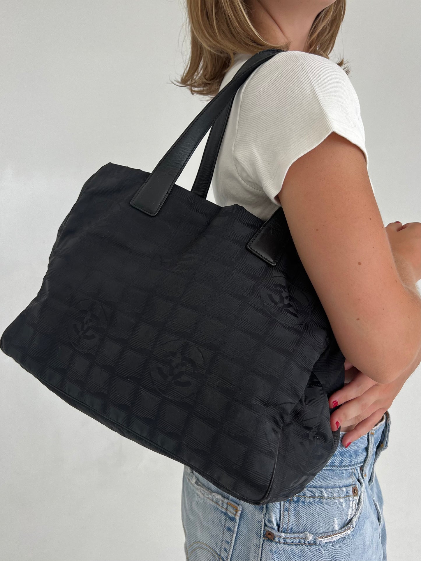 Chanel black travel tote